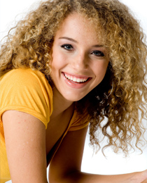 photo of a young smiling man with nice teeth